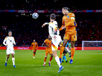 Germany forward Kai Havertz and Netherlands defender Virgil van Dijk during the match between the Netherlands and Germany at the Johan Cruij...