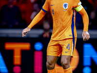 Netherlands defender Virgil van Dijk plays during the match between the Netherlands and Germany at the Johan Cruijff ArenA for the UEFA Nati...