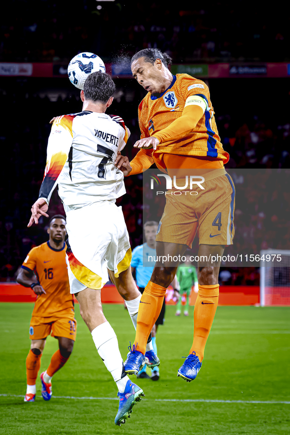 Germany forward Kai Havertz and Netherlands defender Virgil van Dijk during the match between the Netherlands and Germany at the Johan Cruij...