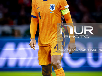 Netherlands defender Virgil van Dijk plays during the match between the Netherlands and Germany at the Johan Cruijff ArenA for the UEFA Nati...