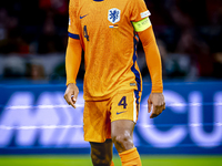 Netherlands defender Virgil van Dijk plays during the match between the Netherlands and Germany at the Johan Cruijff ArenA for the UEFA Nati...