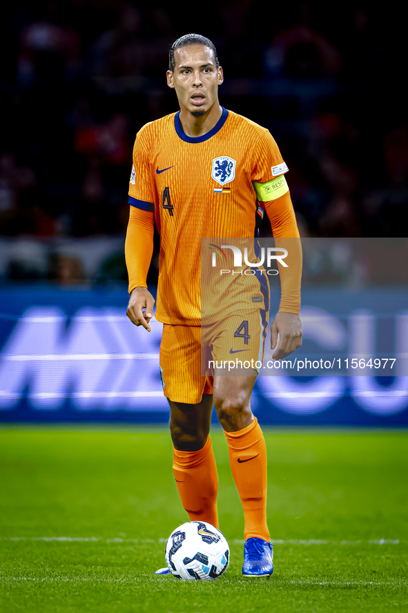 Netherlands defender Virgil van Dijk plays during the match between the Netherlands and Germany at the Johan Cruijff ArenA for the UEFA Nati...