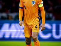 Netherlands defender Virgil van Dijk plays during the match between the Netherlands and Germany at the Johan Cruijff ArenA for the UEFA Nati...