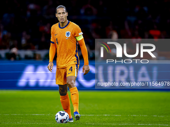 Netherlands defender Virgil van Dijk plays during the match between the Netherlands and Germany at the Johan Cruijff ArenA for the UEFA Nati...