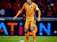 Netherlands defender Virgil van Dijk plays during the match between the Netherlands and Germany at the Johan Cruijff ArenA for the UEFA Nati...