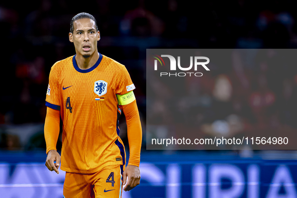 Netherlands defender Virgil van Dijk plays during the match between the Netherlands and Germany at the Johan Cruijff ArenA for the UEFA Nati...