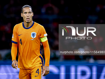 Netherlands defender Virgil van Dijk plays during the match between the Netherlands and Germany at the Johan Cruijff ArenA for the UEFA Nati...