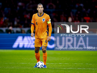 Netherlands defender Virgil van Dijk plays during the match between the Netherlands and Germany at the Johan Cruijff ArenA for the UEFA Nati...