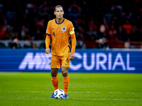 Netherlands defender Virgil van Dijk plays during the match between the Netherlands and Germany at the Johan Cruijff ArenA for the UEFA Nati...