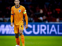 Netherlands defender Virgil van Dijk plays during the match between the Netherlands and Germany at the Johan Cruijff ArenA for the UEFA Nati...