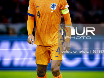 Netherlands defender Virgil van Dijk plays during the match between the Netherlands and Germany at the Johan Cruijff ArenA for the UEFA Nati...