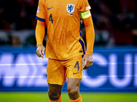 Netherlands defender Virgil van Dijk plays during the match between the Netherlands and Germany at the Johan Cruijff ArenA for the UEFA Nati...