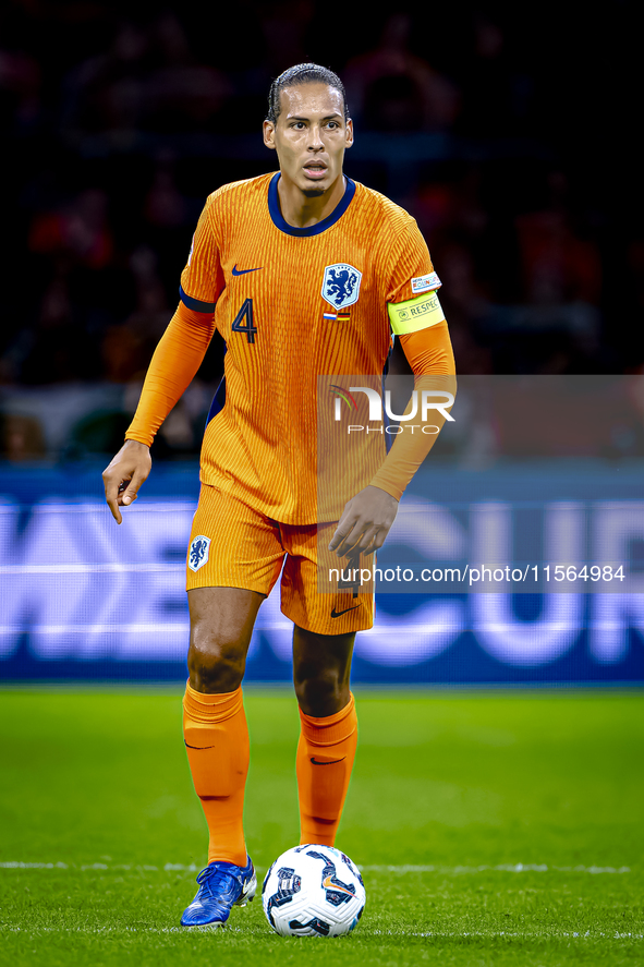 Netherlands defender Virgil van Dijk plays during the match between the Netherlands and Germany at the Johan Cruijff ArenA for the UEFA Nati...