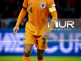 Netherlands defender Virgil van Dijk plays during the match between the Netherlands and Germany at the Johan Cruijff ArenA for the UEFA Nati...