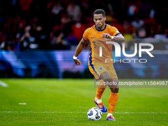 Netherlands defender Jurrien Timber plays during the match between the Netherlands and Germany at the Johan Cruijff ArenA for the UEFA Natio...