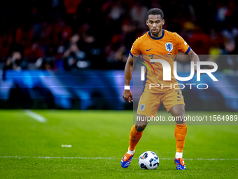 Netherlands defender Jurrien Timber plays during the match between the Netherlands and Germany at the Johan Cruijff ArenA for the UEFA Natio...