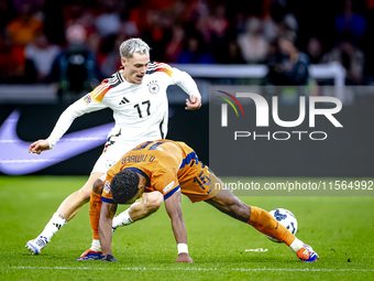 Germany forward Kai Havertz and Netherlands midfielder Quinten Timber during the match between the Netherlands and Germany at the Johan Crui...