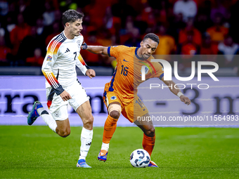 Germany forward Kai Havertz and Netherlands midfielder Quinten Timber during the match between the Netherlands and Germany at the Johan Crui...