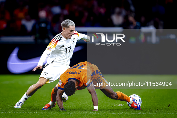 Germany forward Kai Havertz and Netherlands midfielder Quinten Timber during the match between the Netherlands and Germany at the Johan Crui...