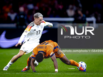 Germany forward Kai Havertz and Netherlands midfielder Quinten Timber during the match between the Netherlands and Germany at the Johan Crui...