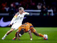 Germany forward Kai Havertz and Netherlands midfielder Quinten Timber during the match between the Netherlands and Germany at the Johan Crui...