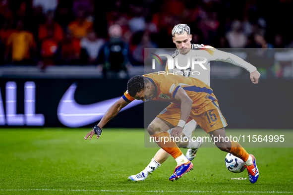 Germany forward Kai Havertz and Netherlands midfielder Quinten Timber during the match between the Netherlands and Germany at the Johan Crui...