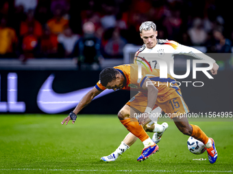 Germany forward Kai Havertz and Netherlands midfielder Quinten Timber during the match between the Netherlands and Germany at the Johan Crui...