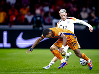 Germany forward Kai Havertz and Netherlands midfielder Quinten Timber during the match between the Netherlands and Germany at the Johan Crui...