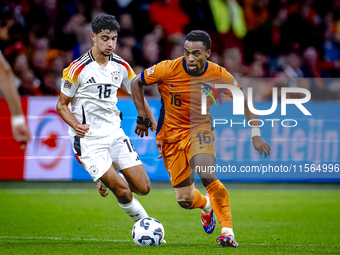 Germany midfielder Aleksander Pavlovic and Netherlands midfielder Quinten Timber during the match between the Netherlands and Germany at the...