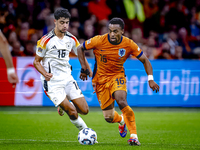 Germany midfielder Aleksander Pavlovic and Netherlands midfielder Quinten Timber during the match between the Netherlands and Germany at the...