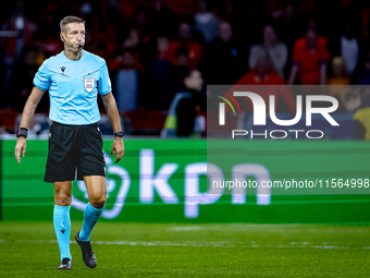 Referee Davide Massa officiates the match between the Netherlands and Germany at the Johan Cruijff ArenA for the UEFA Nations League, League...