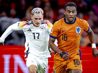 Germany midfielder Florian Wirtz and Netherlands midfielder Quinten Timber during the match between the Netherlands and Germany at the Johan...