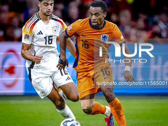 Germany midfielder Aleksander Pavlovic and Netherlands midfielder Quinten Timber during the match between the Netherlands and Germany at the...