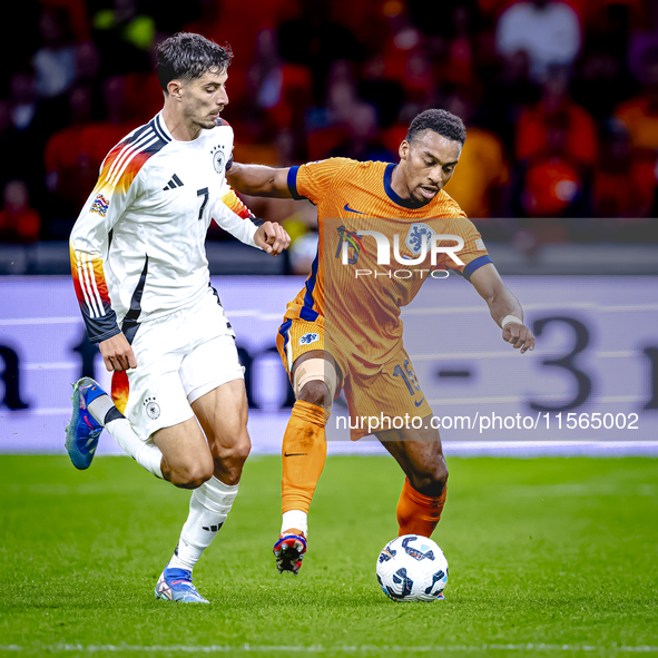 Germany forward Kai Havertz and Netherlands midfielder Quinten Timber during the match between the Netherlands and Germany at the Johan Crui...