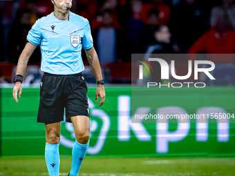 Referee Davide Massa officiates the match between the Netherlands and Germany at the Johan Cruijff ArenA for the UEFA Nations League, League...