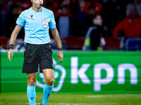 Referee Davide Massa officiates the match between the Netherlands and Germany at the Johan Cruijff ArenA for the UEFA Nations League, League...