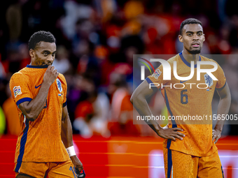 Netherlands midfielders Quinten Timber and Ryan Gravenberch play during the match between the Netherlands and Germany at the Johan Cruijff A...