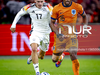 Germany midfielder Florian Wirtz and Netherlands midfielder Quinten Timber during the match between the Netherlands and Germany at the Johan...