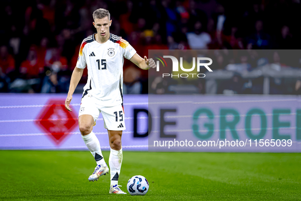 Germany defender Nico Schlotterbeck plays during the match between the Netherlands and Germany at the Johan Cruijff ArenA for the UEFA Natio...