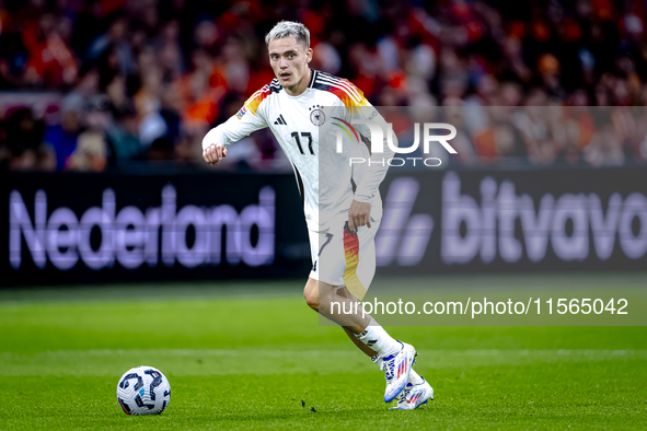 Germany midfielder Florian Wirtz plays during the match between the Netherlands and Germany at the Johan Cruijff ArenA for the UEFA Nations...