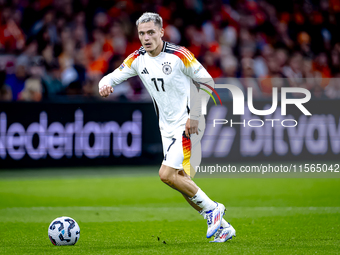 Germany midfielder Florian Wirtz plays during the match between the Netherlands and Germany at the Johan Cruijff ArenA for the UEFA Nations...