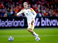 Germany midfielder Florian Wirtz plays during the match between the Netherlands and Germany at the Johan Cruijff ArenA for the UEFA Nations...