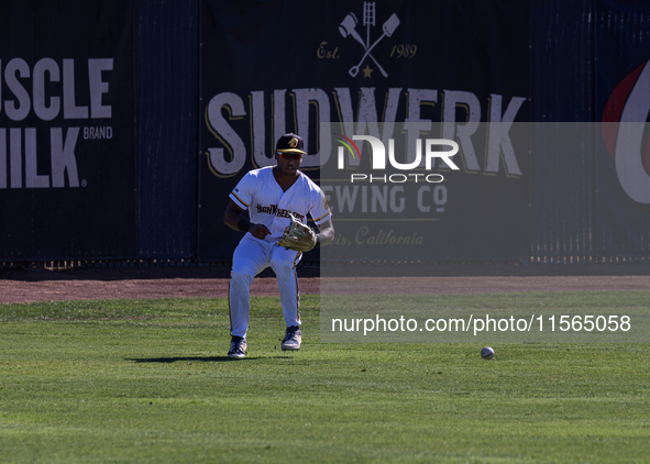 The Yolo High Wheelers (14) beat the Oakland Ballers (4) in game 1 (round 1) of the Pioneer Baseball League's playoffs in Davis, Calif., on...