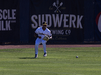 The Yolo High Wheelers (14) beat the Oakland Ballers (4) in game 1 (round 1) of the Pioneer Baseball League's playoffs in Davis, Calif., on...