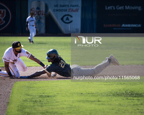 The Yolo High Wheelers (14) beat the Oakland Ballers (4) in game 1 (round 1) of the Pioneer Baseball League's playoffs in Davis, Calif., on...