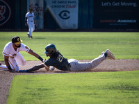 The Yolo High Wheelers (14) beat the Oakland Ballers (4) in game 1 (round 1) of the Pioneer Baseball League's playoffs in Davis, Calif., on...