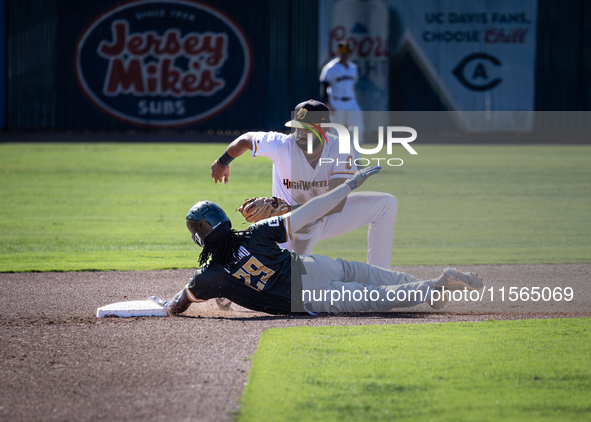 The Yolo High Wheelers (14) beat the Oakland Ballers (4) in game 1 (round 1) of the Pioneer Baseball League's playoffs in Davis, Calif., on...