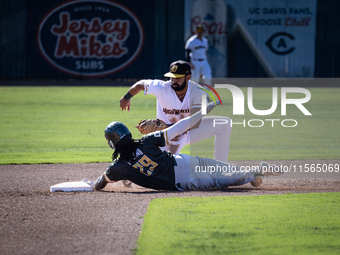 The Yolo High Wheelers (14) beat the Oakland Ballers (4) in game 1 (round 1) of the Pioneer Baseball League's playoffs in Davis, Calif., on...