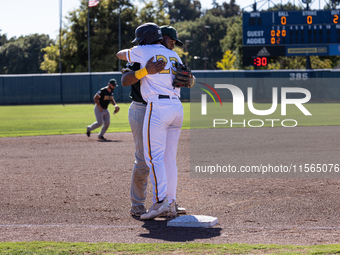 The Yolo High Wheelers (14) beat the Oakland Ballers (4) in game 1 (round 1) of the Pioneer Baseball League's playoffs in Davis, Calif., on...