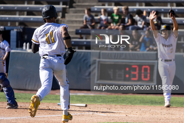 The Yolo High Wheelers (14) beat the Oakland Ballers (4) in game 1 (round 1) of the Pioneer Baseball League's playoffs in Davis, Calif., on...